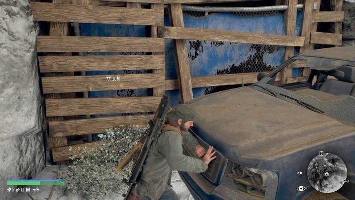 Podejdź do jaskini i przepchaj niebieskiego SUVa, który blokuje wejście - Days Gone: Dobry żołnierz - solucja, opis przejścia - Days Gone - poradnik do gry