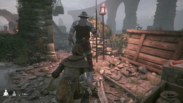 Po uporaniu się z przeciwnikiem, zapal latarnię i podejdź do płonącego trebusza - A Plague Tale Innocence: Czas kruków - solucja, opis przejścia - A Plague Tale Innocence - poradnik do gry