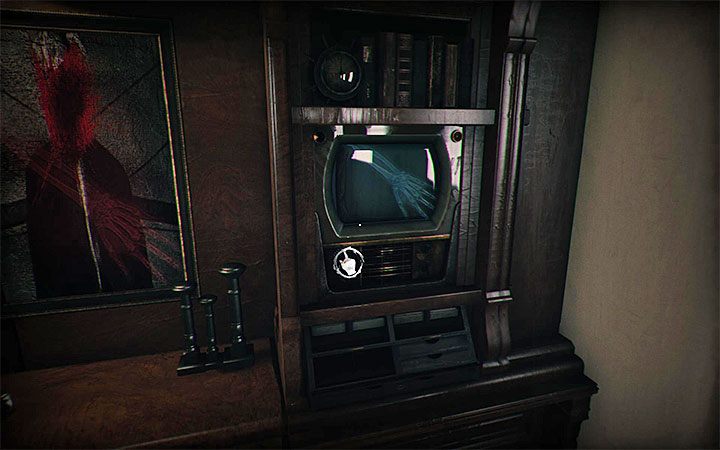 Użyj pokrętła prawego telewizora żeby wybrać zdjęcie dłoni zwróconej w prawo - Zagadka z dwoma telewizorami i rentgenami | Zagadki w Layers of Fear 2 - Layers of Fear 2 - poradnik do gry
