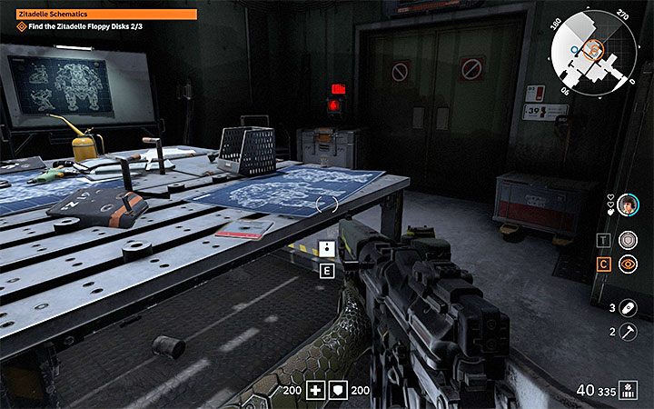 Pozostałe dyskietki są w kolejnej hali, do której możesz dotrzeć po wejściu po schodach na piętro i dotarciu do żółtej bramy nadającej się do podniesienia - Zitadelle Schematics | Misje poboczne w Wolfenstein Youngblood - Wolfenstein: Youngblood - poradnik do gry