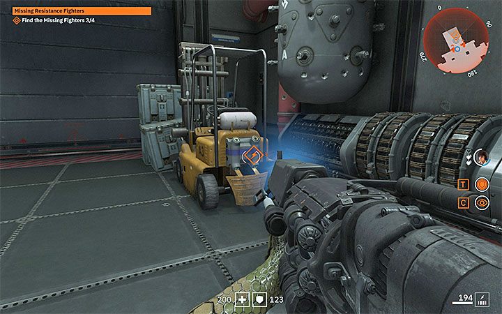 Zwłoki przykrywa ładunek wózka widłowego - Missing Resistance Fighters | Misje poboczne w Wolfenstein Youngblood - Wolfenstein: Youngblood - poradnik do gry