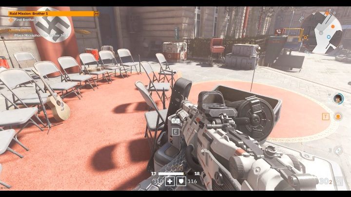 Na stole, koło miejsca przemówień znajdziesz labo kasetę - Mały Berlin / Little Berlin | Sekrety w Wolfenstein Youngblood - Wolfenstein: Youngblood - poradnik do gry