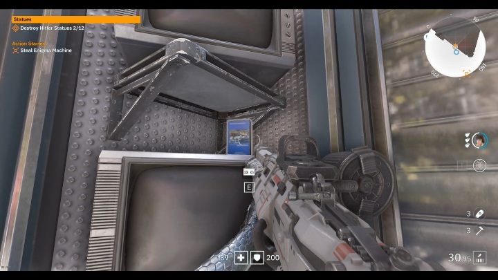 Niebieską kasetę znajdziesz na witrynie sklepowej, pełniej telewizorów - Mały Berlin / Little Berlin | Sekrety w Wolfenstein Youngblood - Wolfenstein: Youngblood - poradnik do gry