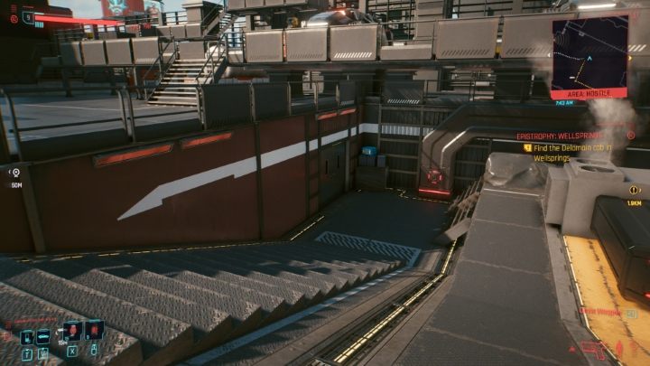 Kieruj się zgodnie z ulicą, aż ujrzysz schody prowadzącego do drzwi - tak jak powyżej - Cyberpunk 2077: Gdzie znaleźć i adoptować kota? - Cyberpunk 2077 - poradnik do gry