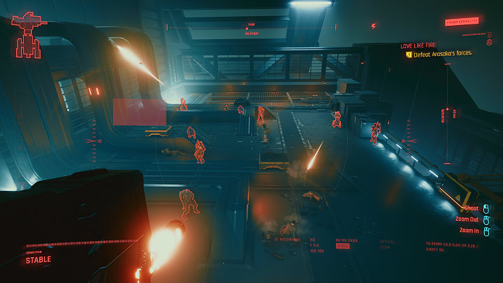 Poczekaj, aż Shaiton zostanie postrzelony, a następnie wskocz za stery karabinu i wyeliminuj wszystkich przeciwników, którzy znajdują się na dachu wieżowca, a także wieżyczki strzelnicze - Cyberpunk 2077: Operacja Firestorm/Love Like Fire - solucja, opis przejścia - Cyberpunk 2077 - poradnik do gry