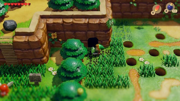 Podejdź kawałek w lewo, postaraj się unikać dziur w ziemi i umieść bombę obok kolejnej popękanej ściany znajdującej się przy drzewie - Anglers Tunnel | Solucja The Legend of Zelda Links Awakening - The Legend of Zelda Links Awakening - poradnik do gry