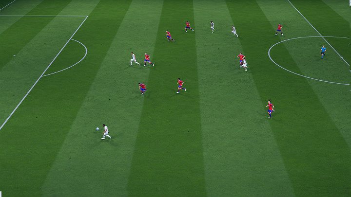 Podanie prostopadłe po ziemi na wybiegającego zawodnika to świetny sposób na zaskoczenie defensywy rywala i duża szansa na zdobycie gola - Podania w FIFA 20 - FIFA 20 - poradnik do gry