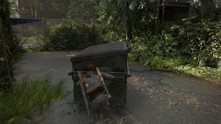 Ten sam kontener przystaw teraz do siatki, by wyskoczyć na drugą stronę - The Last of Us 2: Szkoła podstawowa w Eastbrook - solucja, opis przejścia - The Last of Us 2 - poradnik do gry