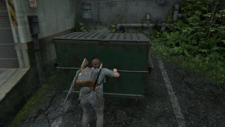 Dotrzesz na plac, w którym możesz podejść do bramki, otworzyć ją i zyskać dostęp do zielonego kontenera - The Last of Us 2: Hillcrest - solucja, opis przejścia - The Last of Us 2 - poradnik do gry