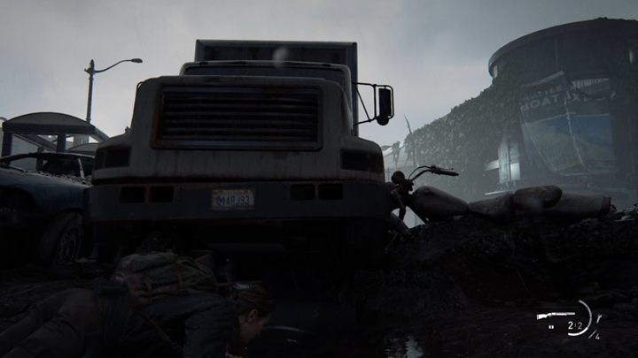Gdy dotrzesz do ciężarówki, przeczołgaj się pod nią, a będziesz mógł zanurkować pod wodą - The Last of Us 2: Przystań - solucja, opis przejścia - The Last of Us 2 - poradnik do gry