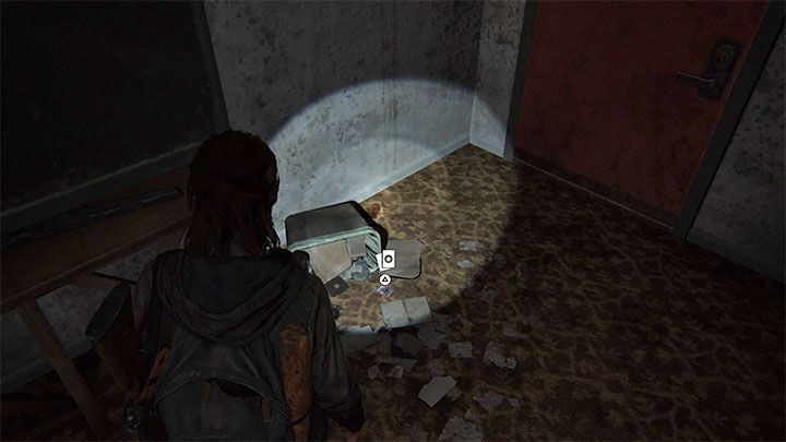 Karta kolekcjonerska leży na podłodze we wspomnianym pokoju motelowym - The Last of Us 2: Capitol Hill sekrety, znajdźki - The Last of Us 2 - poradnik do gry