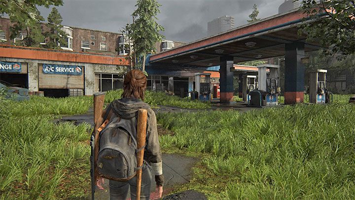 Podążaj główną ścieżką aż dotrzesz do pokazanej na obrazku stacji benzynowej - The Last of Us 2: Capitol Hill sekrety, znajdźki - The Last of Us 2 - poradnik do gry