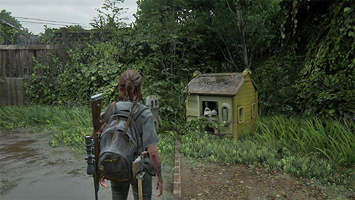 Zainteresuj się pokazanym na obrazku żółtym domkiem dla dzieci, który zlokalizowany jest po lewej stronie - The Last of Us 2: Hillcrest sekrety, znajdźki - The Last of Us 2 - poradnik do gry