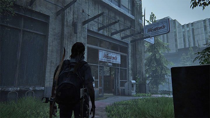 Zainteresuj się budynkiem apteki Westons Pharmacy po lewej stronie - The Last of Us 2: W poszukiwaniu Nory / The Seraphites sekrety, znajdźki - The Last of Us 2 - poradnik do gry