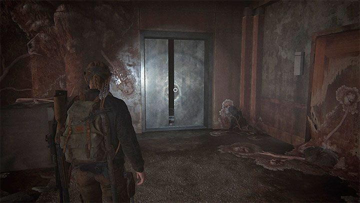 Sekret znajdziesz niedługo po dotarciu do pokazanych na obrazku drzwi windy - The Last of Us 2: Zejście sekrety / The Descent, znajdźki - The Last of Us 2 - poradnik do gry