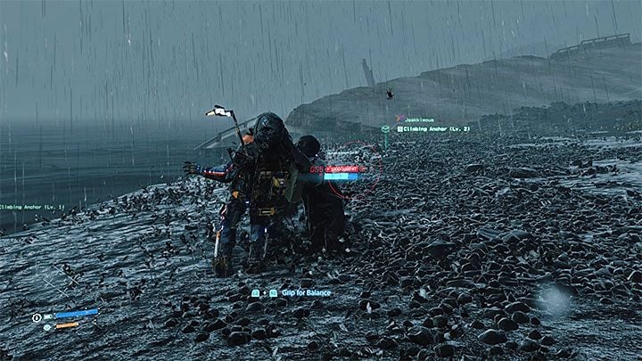 Podążaj wzdłuż brzegu aż dotrzesz do miejsca z wynurzonymi - Jak przejść przez zbiornik ze smołą w Death Stranding? - Death Stranding - poradnik do gry