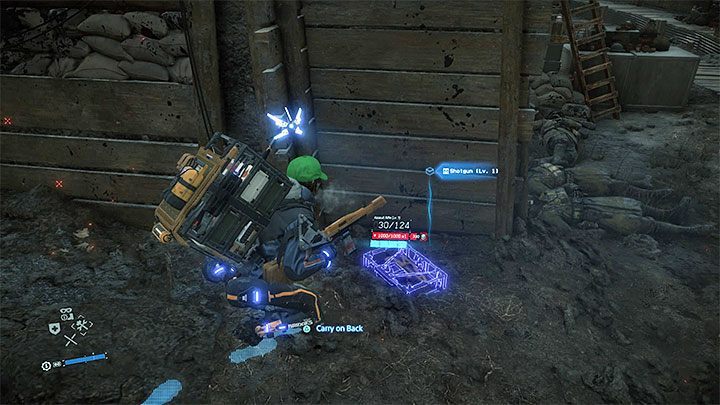 Zanim jeszcze zajmiesz się atakowaniem bossa użyj skanera żeby pozbierać jak najwięcej zapasów z okolicy - Clifford Unger - rozdział 4 | Boss w Death Stranding - Death Stranding - poradnik do gry