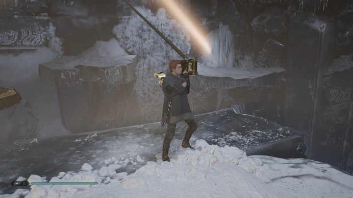 Twoim trzecim zadaniem jest chwycenie za linę przyczepioną do kryształu i przeciągnięcie go tak, aby promień słońca, skierowany był na zlodzoną ścianę - Jak odblokować przejście - Jedi Temple w Jedi Upadły zakon / Fallen Order? - Star Wars Jedi Fallen Order - poradnik do gry