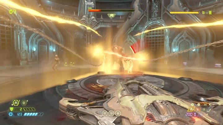 Gdy odbierzesz mu jeden pasek życia, boss straci tarczę i wyciągnie drugą mackę - Doom Eternal: Boss Gladiator | walka, jak pokonać - Doom Eternal - poradnik do gry