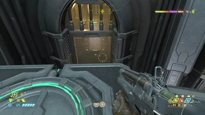 W kolejnej komnacie musisz obrócić się tak, by wskoczyć na ścianę poniżej i drążkami przeskoczyć dalej, aż dotrzesz do przełącznika - Doom Eternal: Baza Kultystów (Cultist Base) solucja, opis przejścia - Doom Eternal - poradnik do gry