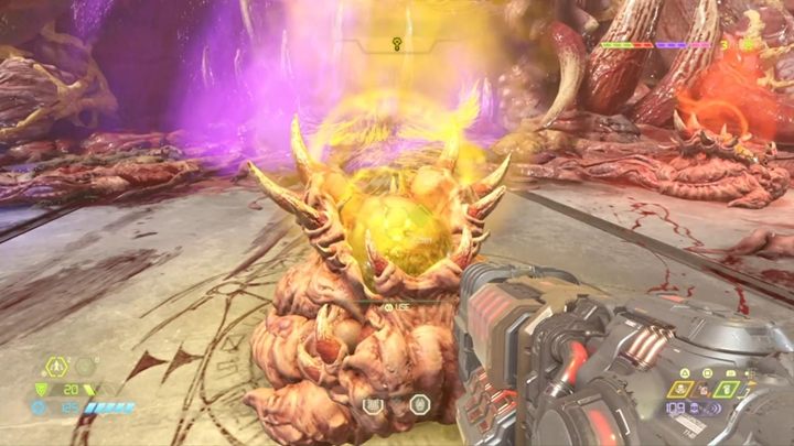 Mając do dyspozycji żółty klucz, cofnij się do pomieszczenia z juchą i przejdź przez żółte wrota - Doom Eternal: Supergniazdo Juchy (Super Gore Nest) solucja, opis przejścia - Doom Eternal - poradnik do gry
