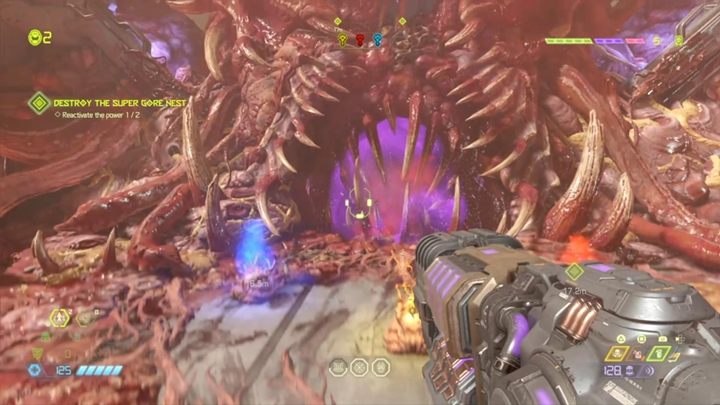 Przejdź przez niebieskie wrota i miń pułapki - Doom Eternal: Supergniazdo Juchy (Super Gore Nest) solucja, opis przejścia - Doom Eternal - poradnik do gry