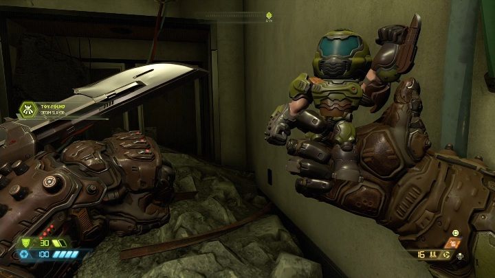 Figurkę Doom Slayera znajdziesz za zamkniętym przejściem, na samej górze zniszczonego budynku - Doom Eternal: Piekło na ziemi | Mapa sekretów, znajdźki - Doom Eternal - poradnik do gry