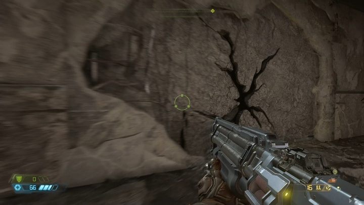 Aby dostać się do figurki musisz zniszczyć szarą ścianę, na której znajduje się widoczne pęknięcie - Doom Eternal: Piekło na ziemi | Mapa sekretów, znajdźki - Doom Eternal - poradnik do gry