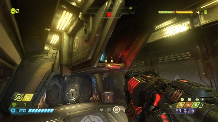 W jednym z korytarzy, pod sufitem, przymocowany jest dodatkowy element - Doom Eternal: Baza Łowców Zagłady | Mapa sekretów, znajdźki - Doom Eternal - poradnik do gry