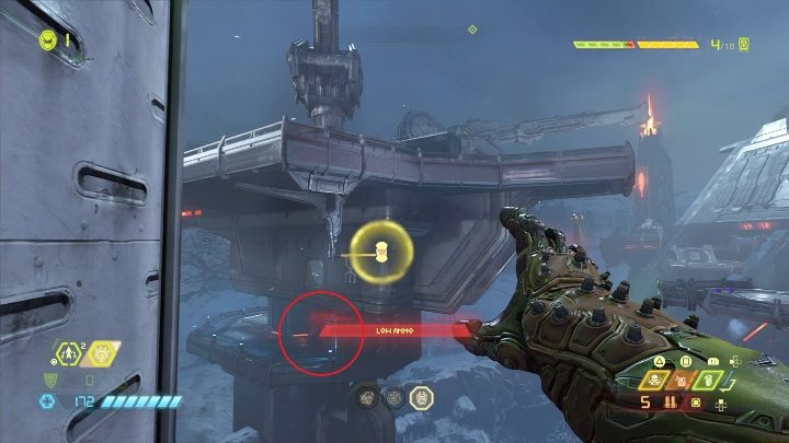 Drugie dodatkowe życie znajdziesz w jednym z metalowych obiektów - Doom Eternal: Baza Łowców Zagłady | Mapa sekretów, znajdźki - Doom Eternal - poradnik do gry