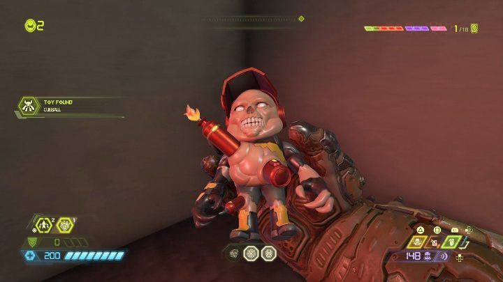 Figurkę znajdziesz urwanym przejściu, które obecnie wygląda jak balkon - Doom Eternal: Kompleks Arc | Mapa sekretów, znajdźki - Doom Eternal - poradnik do gry