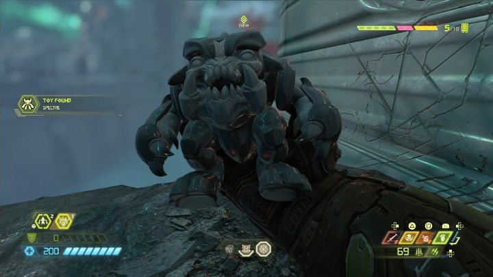 Figurka znajduje się na półce skalnej, położonej po lewej stronie budynku - Doom Eternal: Urdak | Mapa sekretów, znajdźki - Doom Eternal - poradnik do gry