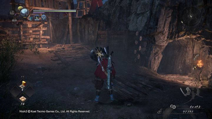 Po prawej stronie znajduje się jaskinia, w której walczyć będziesz z pająkami - Ptak w klatce | Solucja NiOh 2 - NiOh 2 - poradnik do gry