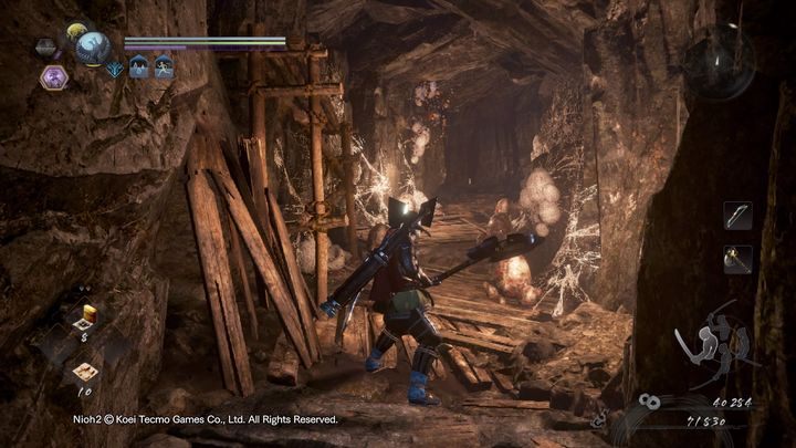 Uważaj na kokony, gdy na nie nadepniesz, istnieje szansa, że wyklują się z nich małe pająki - Ptak w klatce | Solucja NiOh 2 - NiOh 2 - poradnik do gry