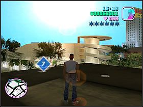Na dachu jednego z budynków nieopodal centrum handlowego (widocznego na obrazku w tle) - Numer 6-10 Hidden Packages - Grand Theft Auto: Vice City - poradnik do gry