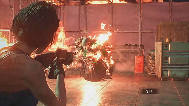 Prowadź walki do momentu, w którym Nemesis uklęknie i upadnie na ziemię - Resident Evil 3: Nemesis, miejsce rozbiórki - Resident Evil 3 - poradnik do gry