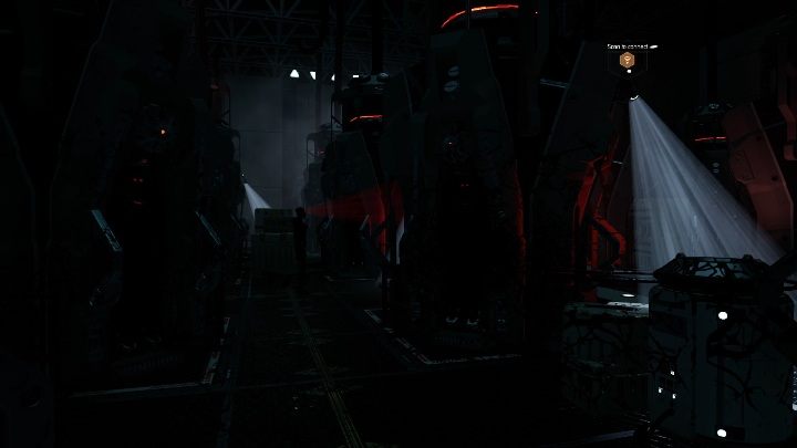 Dzięki karcie trafisz do ciemnego pomieszczenia, w którym nie tylko musisz omijać kamer, ale również robotów - Moons of Madness: Nadciągające zagrożenie, opis przejścia - Moons of Madness - poradnik do gry