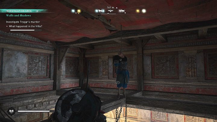 Ostatnią i najlepiej ukrytą wskazówkę znajdziesz na suficie - ciało powieszonego człowieka - Assassins Creed Valhalla: Mury i cienie/Walls and Shadows - solucja - Assassins Creed Valhalla - poradnik do gry