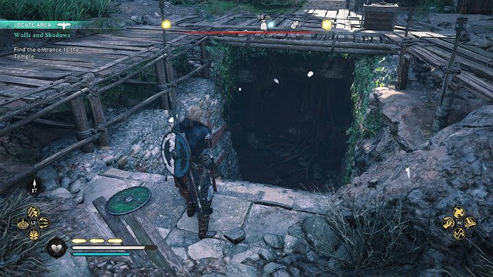 Wejście do świątyni Mitry prowadzi w głąb ziemi, a następnie przez wąską szczelinę w murze z lewej strony - Assassins Creed Valhalla: Mury i cienie/Walls and Shadows - solucja - Assassins Creed Valhalla - poradnik do gry