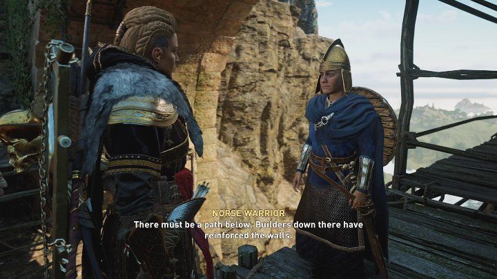 Zwiadowcę Flanna znajdziecie przed wejściem do twierdzy, pod kamiennym mostem - AC Valhalla Gniew Druidów: Przyczółek w Connachcie - solucja - Assassins Creed Valhalla - poradnik do gry