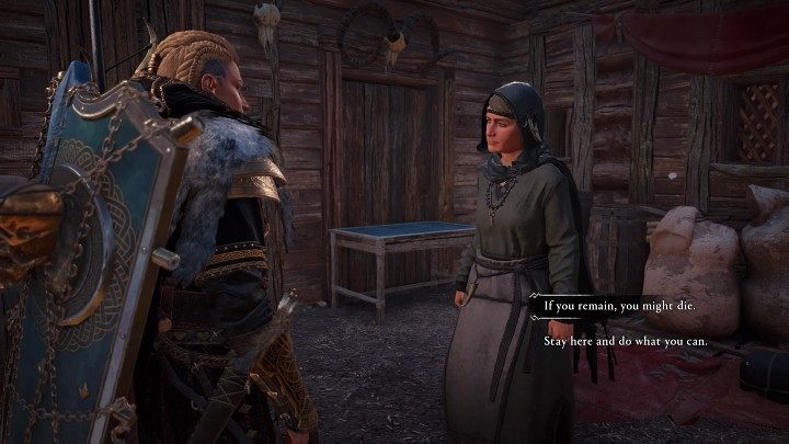 Zakapturzona postać w końcu zatrzyma się i będziesz mógł z nią pomówić - Assassins Creed Valhalla: Osada Jurthgard/The Village Jurthgard - solucja - Assassins Creed Valhalla - poradnik do gry