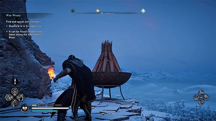 Kosze najłatwiej jest rozpalać pochodnią - wybierz pochodnię z rozwijanego menu (przytrzymaj dolny kierunek na krzyżaku pada) i rzuć nią w kosz (pamiętaj o tym żeby celować nieco wyżej) - Assassins Creed Valhalla: Jest tam kto? - jak zdobyć trofeum? - Assassins Creed Valhalla - poradnik do gry