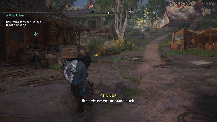 Po przerywniku filmowym weź jeden z bagaży Valki i zaprowadź ją do jej nowego domu - Assassins Creed Valhalla: Mądra przyjaciółka (A Wise Friend) - solucja - Assassins Creed Valhalla - poradnik do gry