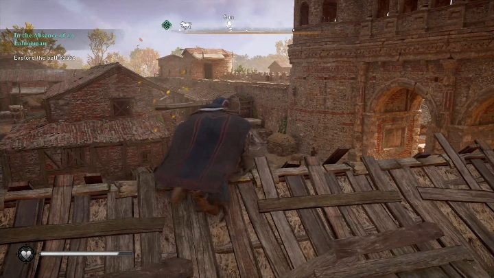 Początek: Kartka znajduje się na drewnianym słupie, koło drewnianych budynków - Assassins Creed Valhalla: Karta niesiona wiatrem - Lincolnscire, sekrety - Assassins Creed Valhalla - poradnik do gry