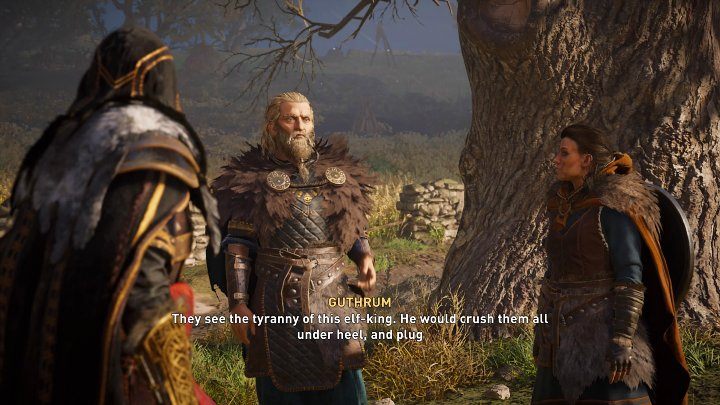 Porozmawiaj z Guthrumem - znajdziesz go w towarzystwie Somy przy drzewie na małym wzniesieniu - Assassins Creed Valhalla: Dzień święty/Holy Day - solucja, opis przejścia - Assassins Creed Valhalla - poradnik do gry
