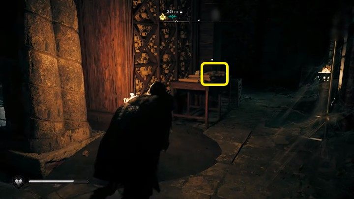 Kodeks Magasa, Strona V (The Magas Codex, Page IV) znajduje się zaraz za regałem ze zwojami, w miejscu zaznaczonym na powyższym obrazku - Assassins Creed Valhalla: Krótka historia ukrytych - solucja, opis przejścia - Assassins Creed Valhalla - poradnik do gry