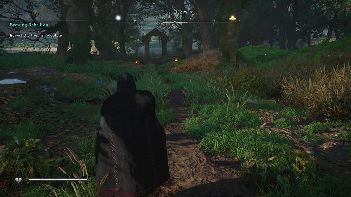 Uwolnionych tanów musisz teraz wyprowadzić z garnizonu i odeskortować do bezpiecznego miejsca na polanie przy rzece - Assassins Creed Valhalla: Podżeganie do buntu/Brewing Rebellion - solucja - Assassins Creed Valhalla - poradnik do gry