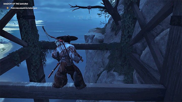 Przeskocz na pierwszą drewnianą podporę, następnie na drugą i wykonaj skok połączony z wciśnięciem R2 i złapaniem się zaczepu z użyciem liny z hakiem - Ghost of Tsushima: Cień samuraja (Shadow of the Samurai) solucja, opis przejścia - Ghost of Tsushima - poradnik do gry