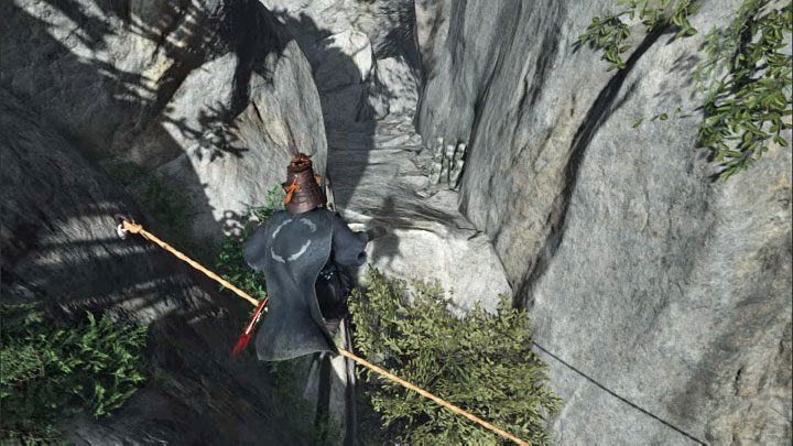 Balansując na rozwieszonej linie wykonajcie skok w stronę bocznej skalnej półki - Ghost of Tsushima Iki Island: Saruiwa - jak dotrzeć na szczyt? - Ghost of Tsushima - poradnik do gry
