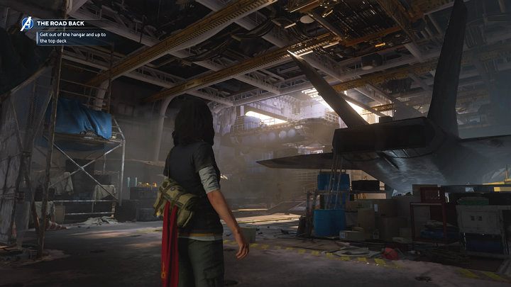 Po wejściu do dużego hangaru z samolotami skręć w prawo, wejdź na schody, rozbij drzwi i przejdź do bocznego pomieszczenia - Marvels Avengers: Droga powrotna - sekrety, znajdźki - Marvels Avengers - poradnik do gry
